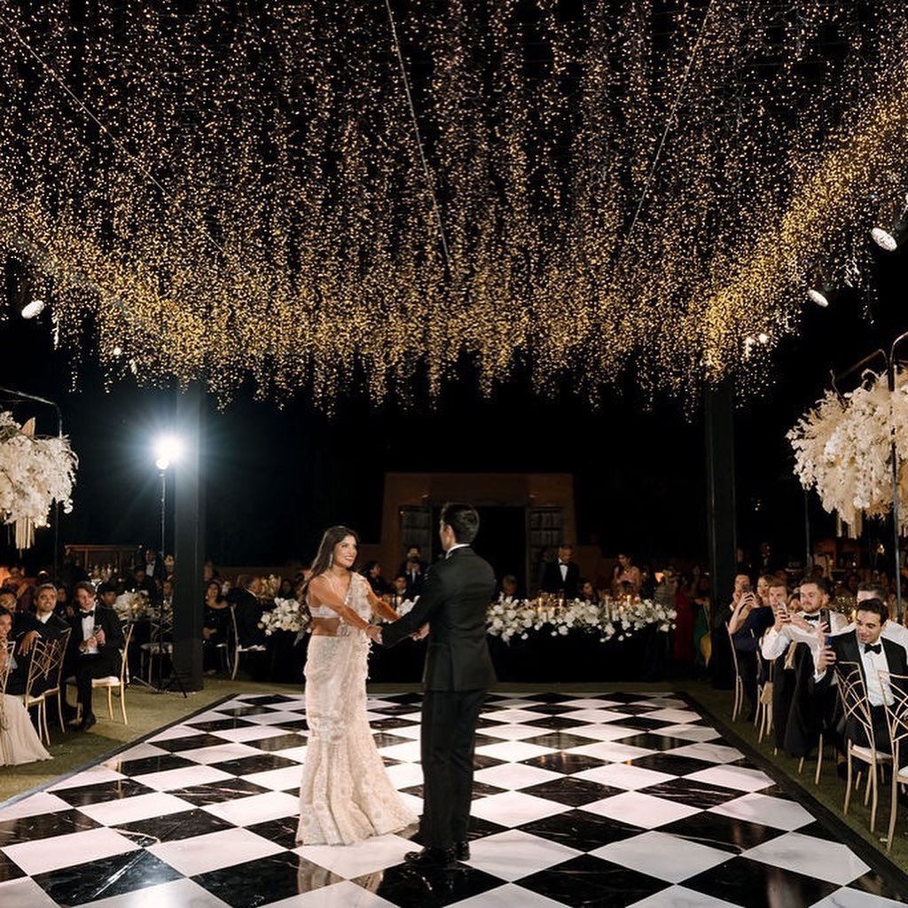 Disco and stars themed cocktail party décor in gold and black