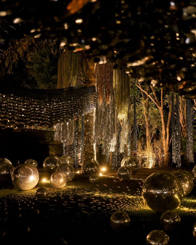 Disco and stars themed cocktail party décor in gold and black