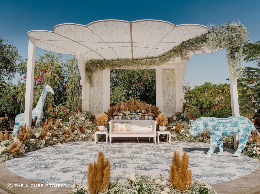 English garden décor with white florals, pampas grass and animal installations