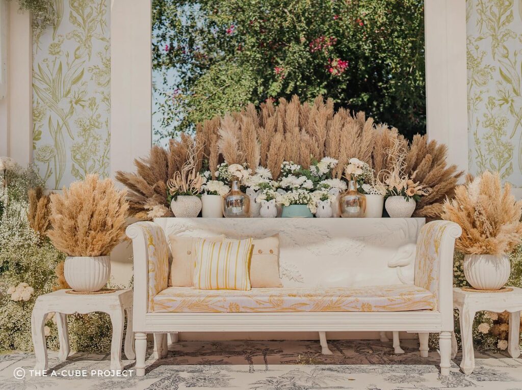 English garden décor with white florals, pampas grass and animal installations