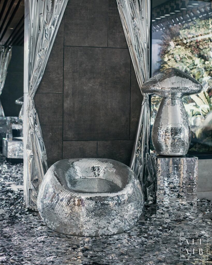 Disco ball themed cocktail décor in silver and mirrors