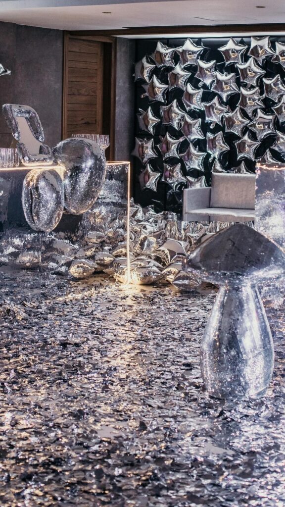 Disco ball themed cocktail décor in silver and mirrors