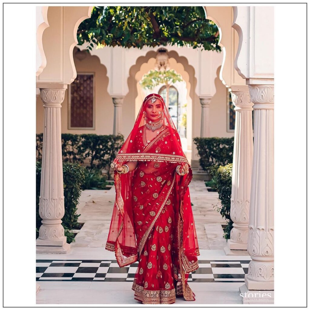 Patralekha in red Sabyasachi sari