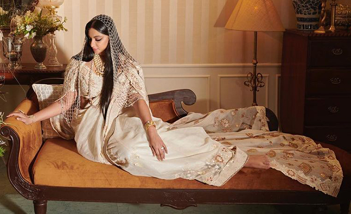 Rhea Kapoor in ivory Anamika Khanna sari