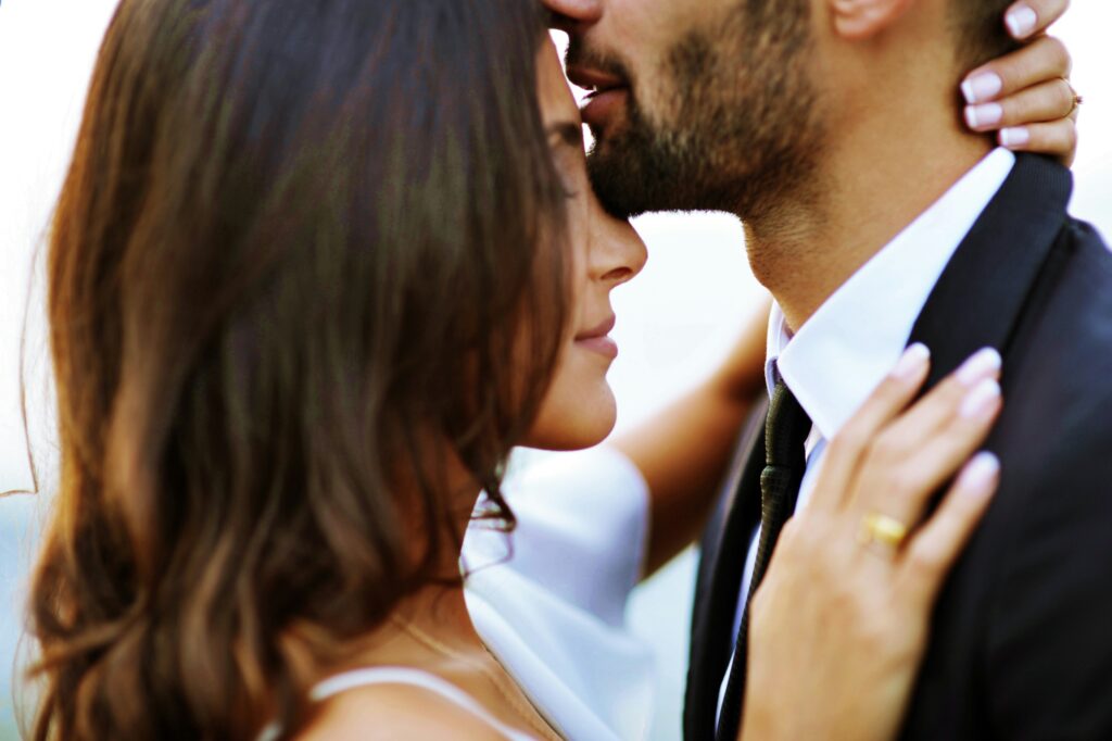 engaged couple with ring showing