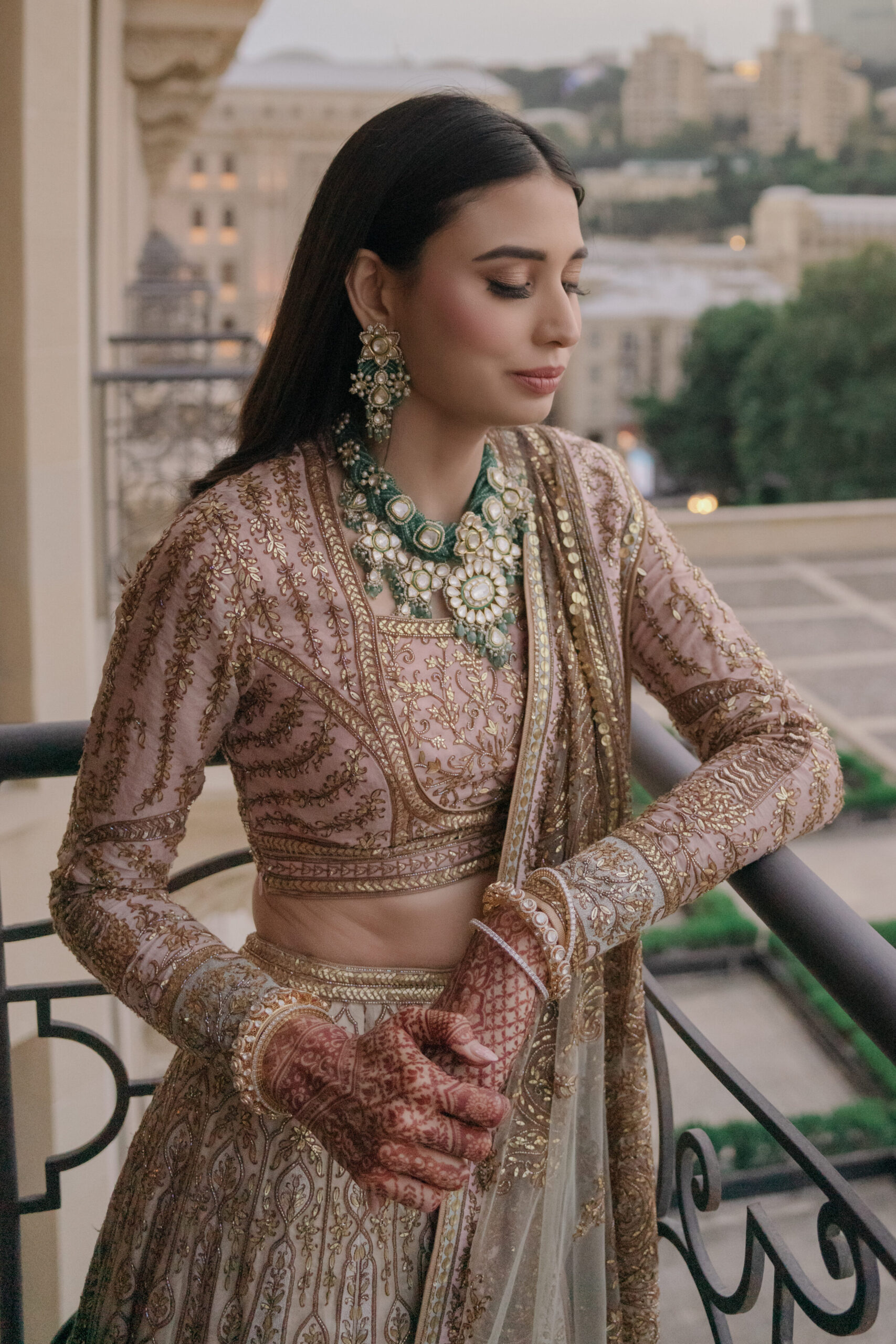 Indian bride wearing green jewels