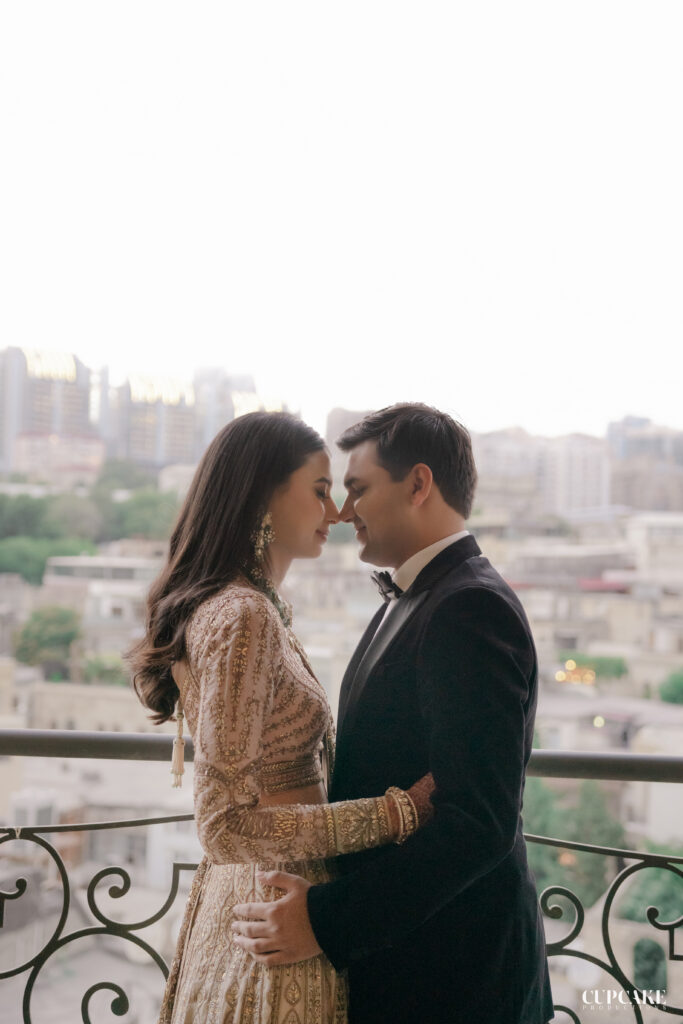 couple kissing on a terrace