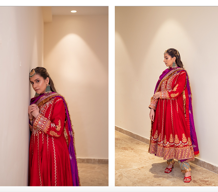 Indian girl wearing red anarkali and green jewellery