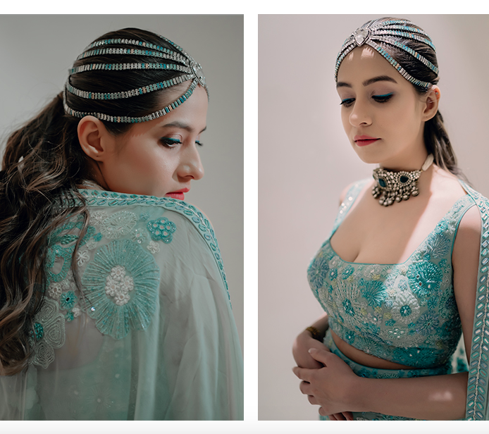 Indian girl wearing big medusa headgear in blue blouse