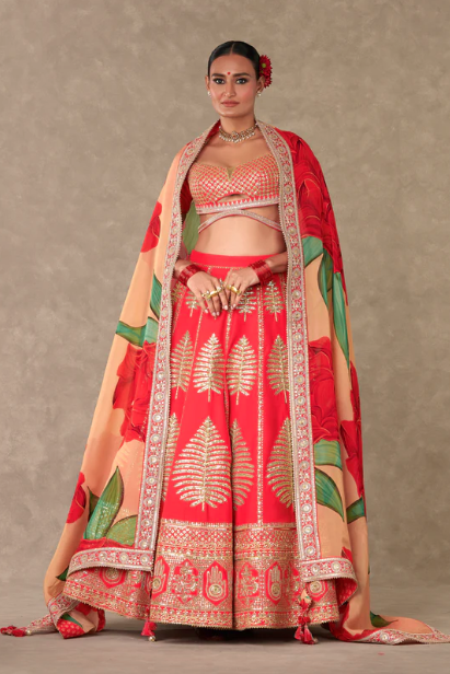 girl wearing red wedding lehenga