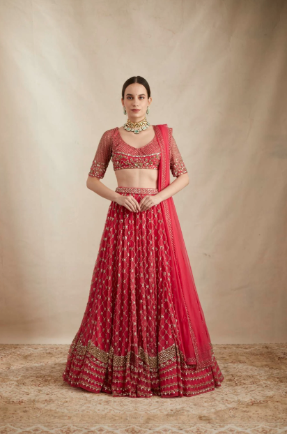 girl in red bridal lehenga and jewellery