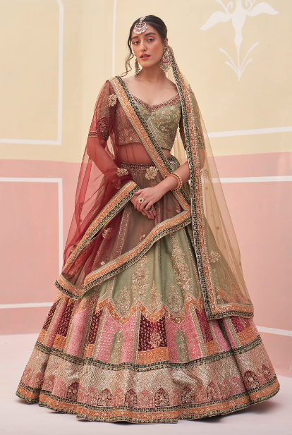 girl wearing green velvet lehenga