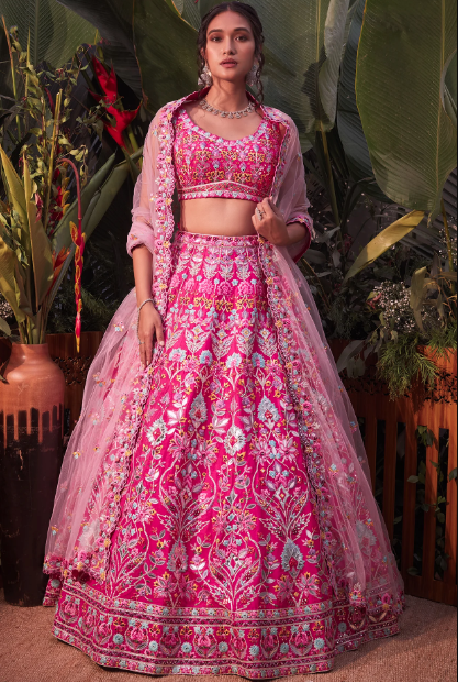 girl wearing barbie pink lehenga set