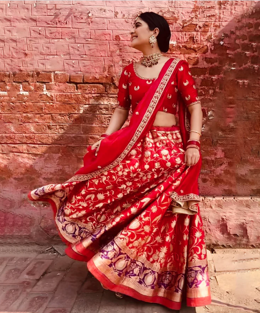 girl twirling in a benarasi lehenga set